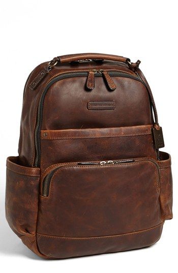 https://citcraft.com/wp-content/uploads/2026/03/Travel-Backpack-Classic-brown-leather-round-zip-bag.jpg